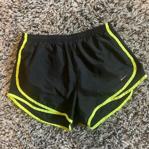 Nike Women's Black Shorts with Yellow Trim